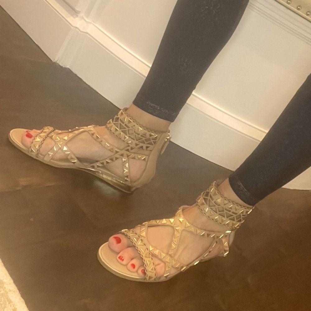 BCBG tan sandals with gold and embellishments.